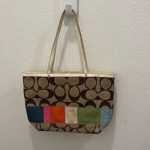 Coach Signature Legacy Stripe bag.